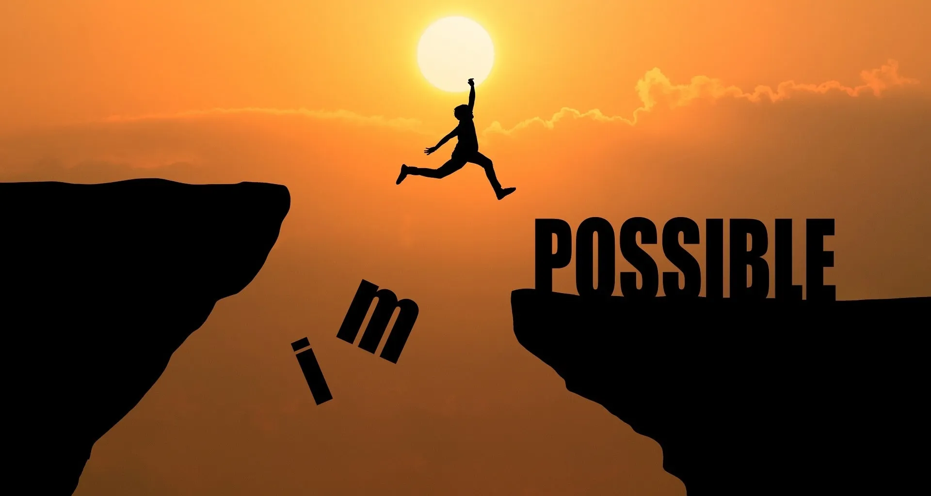A person is jumping from one cliff to another, with the setting sun in the background. The word "IMPOSSIBLE" is split, with "IM" falling away and "POSSIBLE" remaining, symbolizing that the impossible is possible.